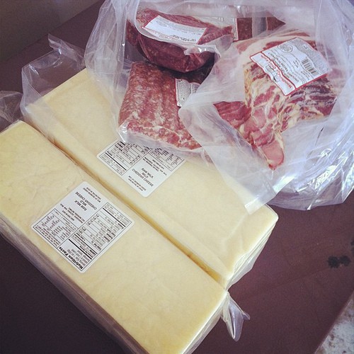 My fridge is happy! Raw cheddar, and pastured beef, sausage, and bacon.