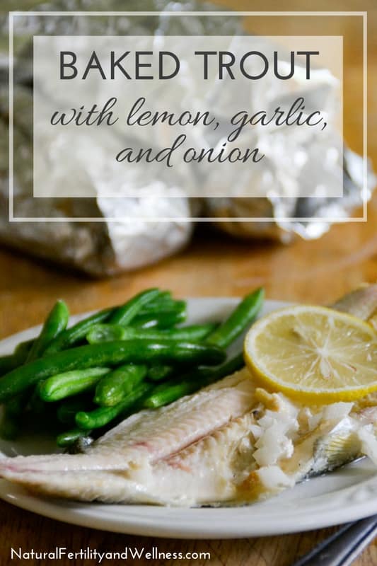 Baked trout with lemon, garlic, and onions