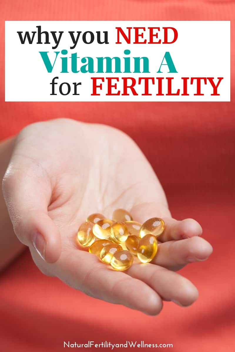 hand holding vitamin a supplements